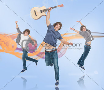 Three of the same young man jumping for joy one holding a guitar