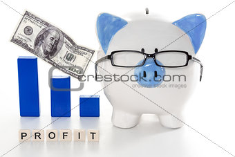 Piggy bank wearing glasses with profit message