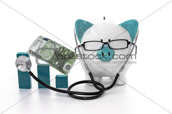 Piggy bank wearing glasses and stethoscope