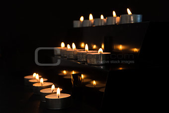 Candles at the alter in the darkness