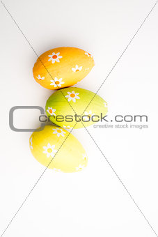 Overhead of three easter eggs