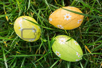 Three easter eggs wrapped in foil