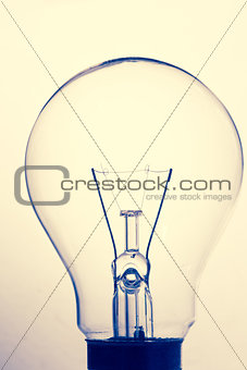 Close up of clear light bulb standing