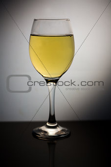 Wine glass full of white wine