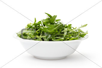 fresh rucola leaves in a bowl