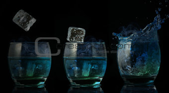 Serial arrangement of ice falling into tumbler of blue liquid