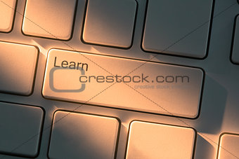 Keyboard with close up on learn button