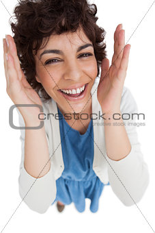 Overhead of smiling woman with hands wide opened
