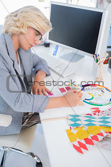 Interior designer looking at colour charts