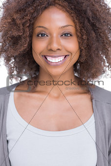 Portrait of smiling brunette woman standing