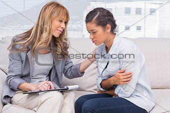 Psychotherapist helping a patient