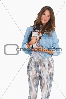 Smiling woman with her puppy