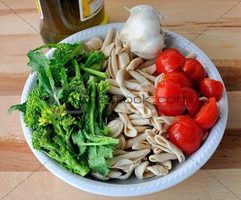 Italian Cuisine - preparation of orecchiette and turnip greens