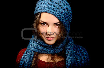A girl with a blue scarf