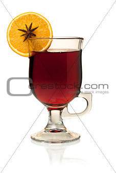 Hot mulled wine with orange slice and anise