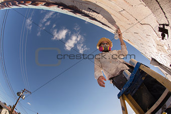 Wide Angle View of Graffit Artist