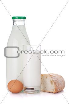 Milk bottle, glass, eggs and bread