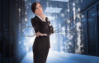 Businesswoman contemplating in data center