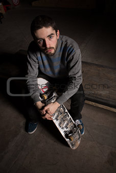 Serious skater looking up at camera