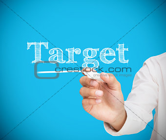 Businessman writing target with a chalk