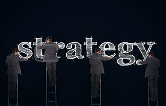 Multiple image of a businessman writing strategy
