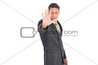 Businessman with raised hand