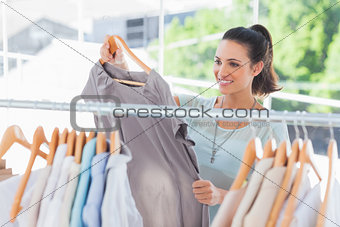 Fashion woman choosing dress