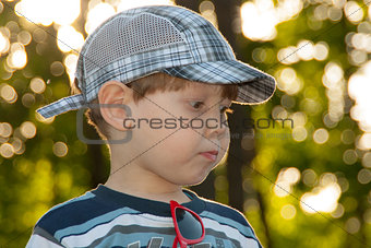 little boy in a cap