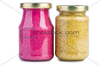 Glass jar with mustard and horseradish red sauce