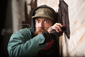 Tense Man Tagging a Wall
