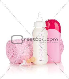 Baby milk bottle, pacifier, shampoo and towel