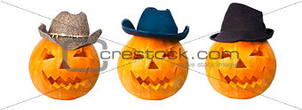 Three cowboy pumpkins