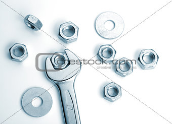 Metal nuts and spanner