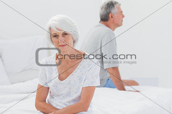 Woman sulking in bed during a conflict