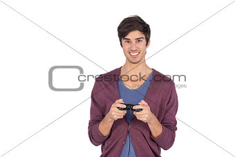 Smiling man holding joystick