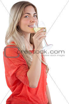 Smiling young woman with wine glass