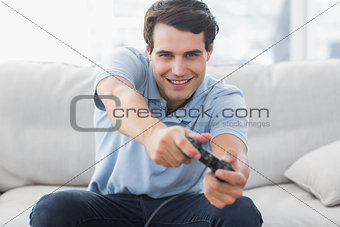 Portrait of a man playing video games