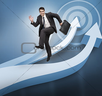 Businessman jumping over blue arrows
