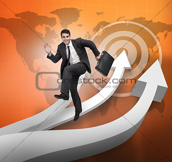 Businessman jumping over arrows and world map