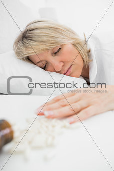 Blonde woman lying motionless after overdose