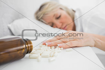 Blonde woman lying motionless after overdosing