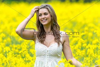 Model In Field Of Flowers