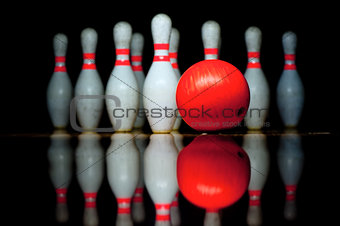Ten bowling pins and ball