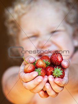 strawberries in palmshands