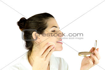 Powdering her face