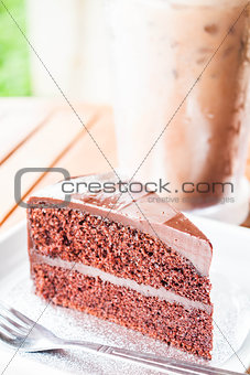 Bitter sweet meal with iced coffee and chocolate cake 