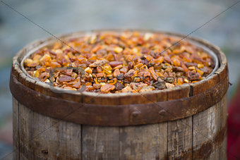 old barrel filled with amber