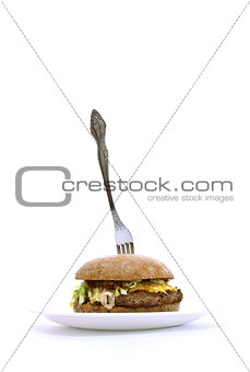 fork stuck in a fat sandwich
