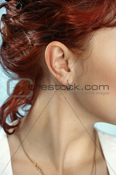 closeup picture of lady ear