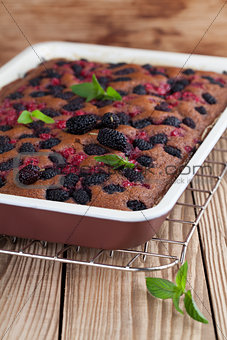 Gingerbread cake with mulberries and red currants
